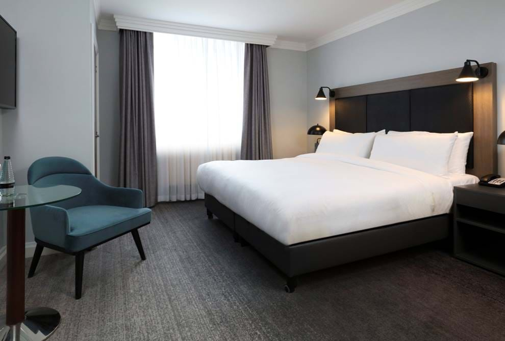 Elevate Your Stay: Discover the Comforts of Our Guest and Deluxe Rooms Image